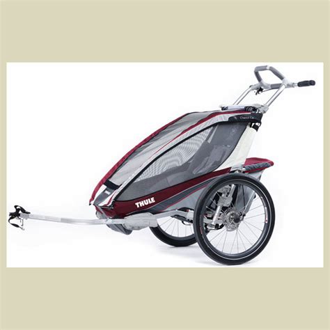 Diagramma di aggancio del Thule Chariot CX 1 alla bicicletta e misure di sicurezza