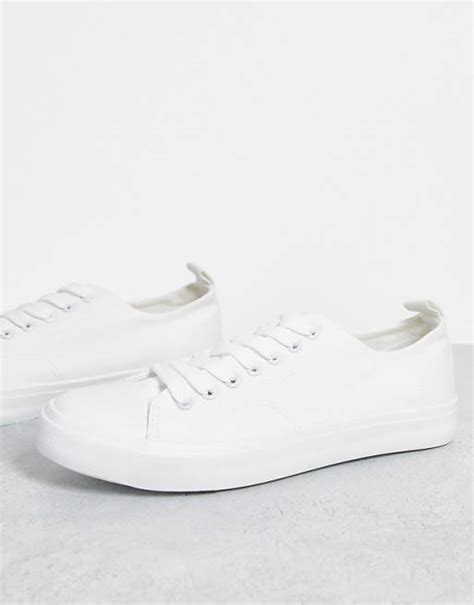 Sneakers in tela bianche