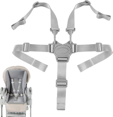 Child securely fastened in a 5-point harness in a stroller