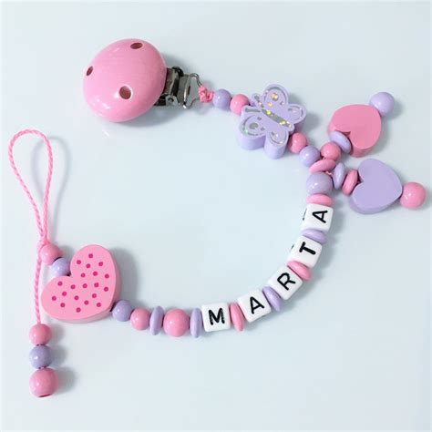 Variazioni di design per porta ciuccio da bambina