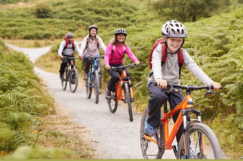 Family cycling with child seat