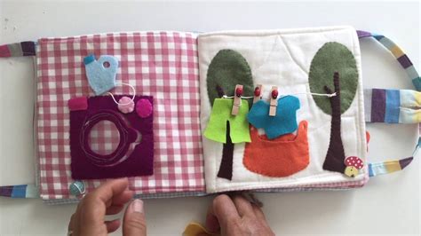 Immagine di un libro di stoffa con disegni di bambini