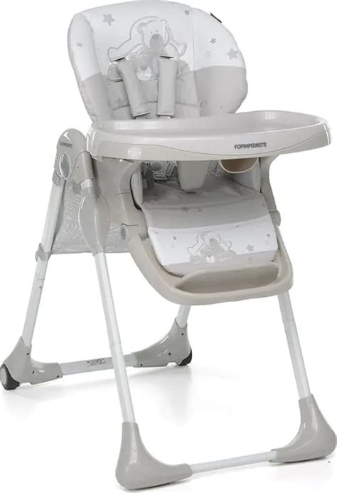 Bambino felice sul seggiolone Foppapedretti Young durante la pappa