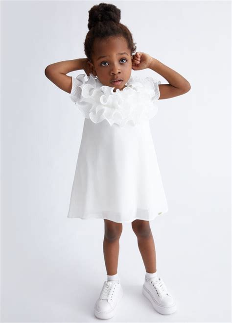 Vestito da bambina con cintura e fiocco