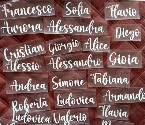 Etichette termoadesive personalizzate con nomi e simboli