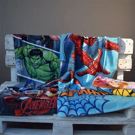 Varietà di teli mare per bambini con personaggi e fantasie popolari