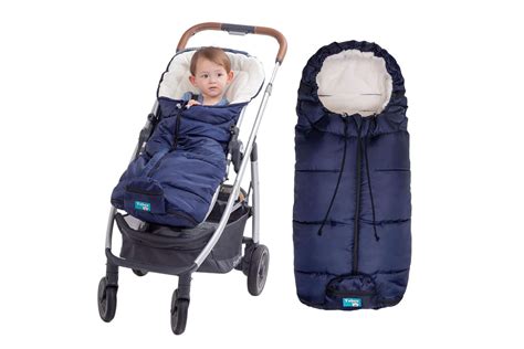 Stroller with child dressed in footmuff