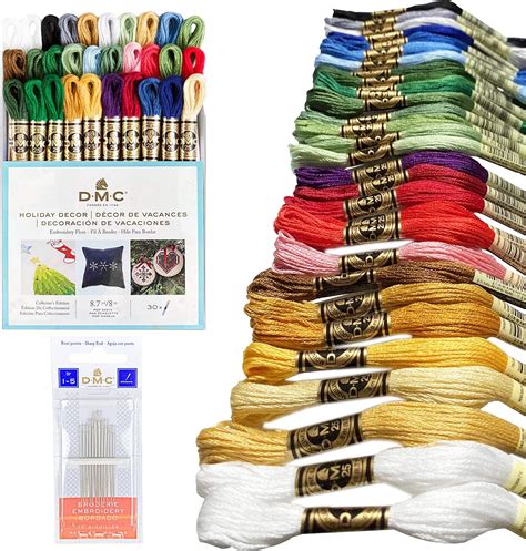 Tavolozza di fili da ricamo DMC colorati e una tela Aida