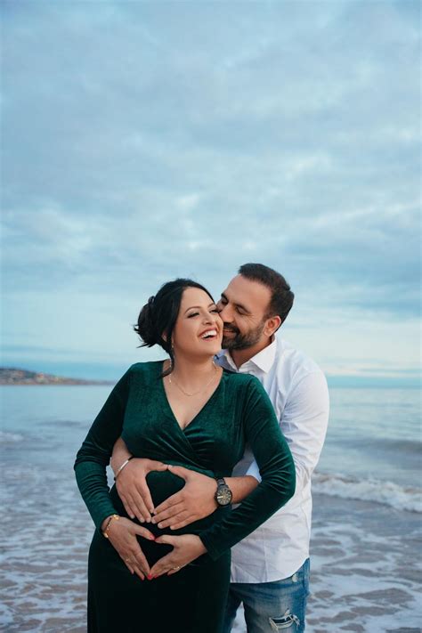 Couple embracing during pregnancy