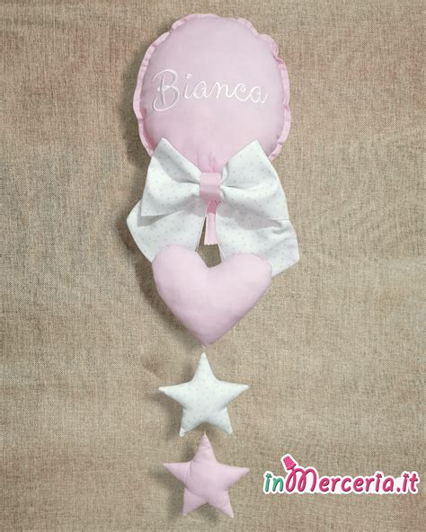 Dettagli stelline e palloncino fiocco nascita