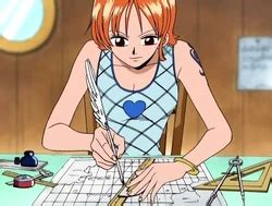 Nami mentre disegna una carta nautica