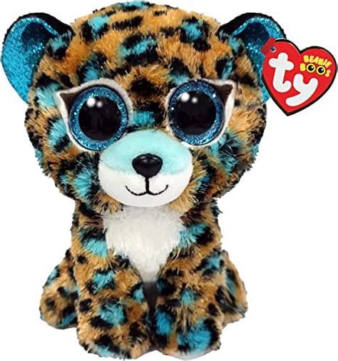 Bambino che abbraccia un peluche Ty Beanie Boos