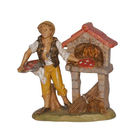Bambini che creano statuine per il presepe