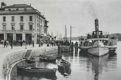 Antica foto del porto di Colico con battelli a vapore