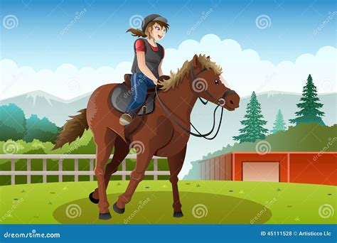 Bambina che monta a cavallo in un maneggio