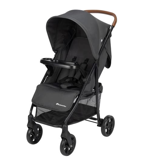 Bambino felice sul passeggino Bébéconfort Misty