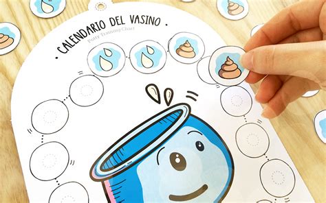 Bambino che attacca un adesivo su un calendario del vasino