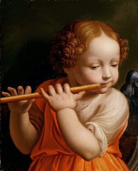 un bambino che suona un flauto di pan