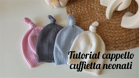 dettaglio sartoriale di un cappellino per neonati