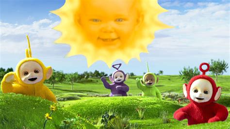 Teletubbies cartoon characters on a sunny hill