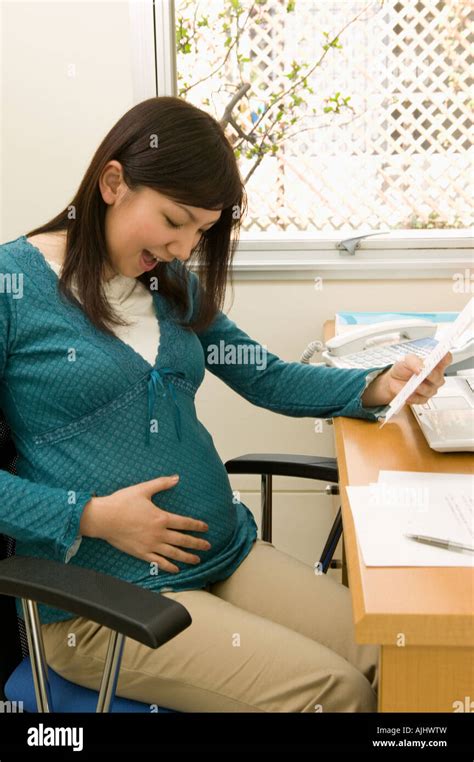 Pregnant woman at work with special arrangements