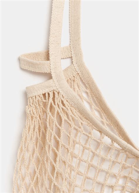 Shopper a rete ricamata