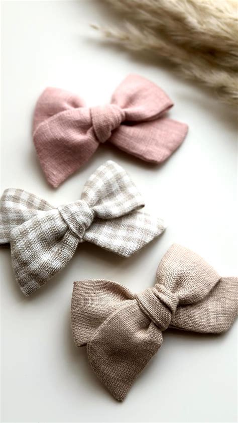 Selection of handcrafted birth bows for babies
