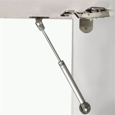 Montaggio cestello: molle e aggancio ai montanti