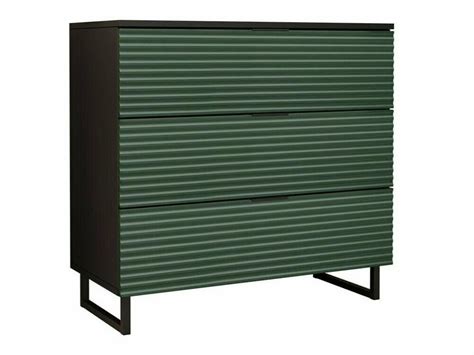 moderna cassettiera verde in una cameretta accogliente