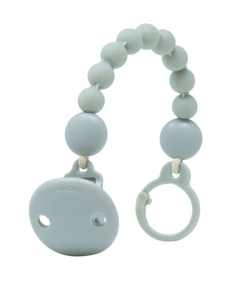 Bambino che mastica una catenella in silicone