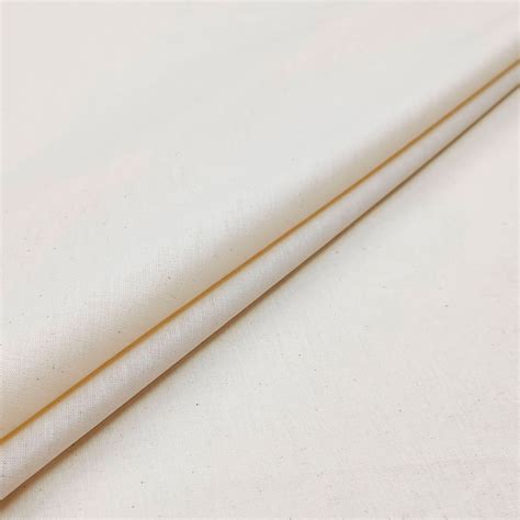 Dettaglio macro di un tessuto in cotone organico per neonati