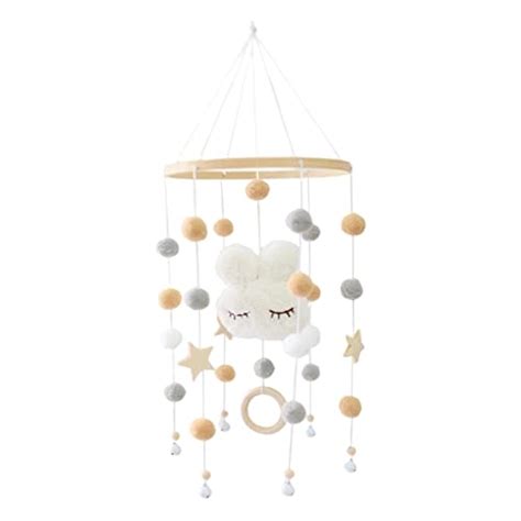 Diversi tipi di giostrine per culla in plastica, legno e feltro