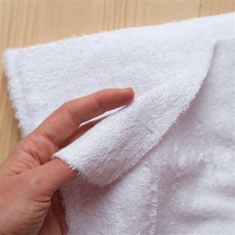 Dettaglio macro della fibra di bambù intrecciata a formare la spugna dell'accappatoio