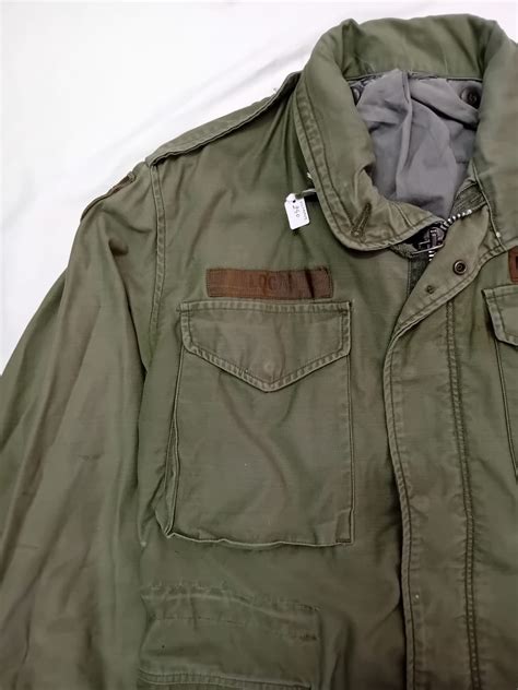 Giacca militare verde da caccia in cotone con dettagli
