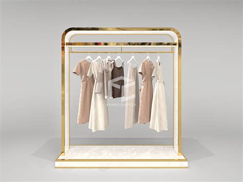 Internal view of a traditional Italian clothing boutique with racks of children's special occasion wear