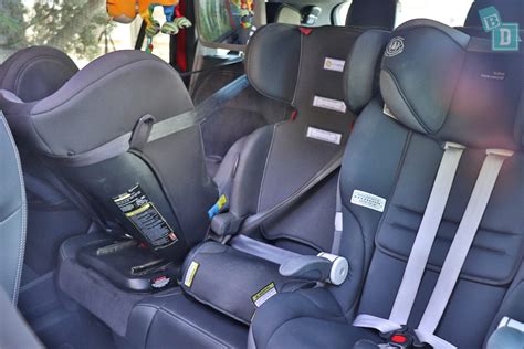 Car interior with three child seats installed with ISOFIX