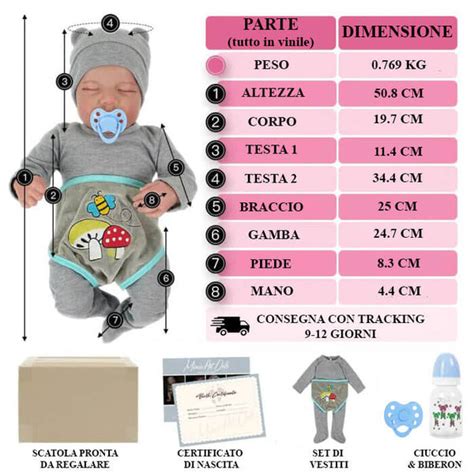 Bambola reborn maschietto di dimensioni standard in una culla
