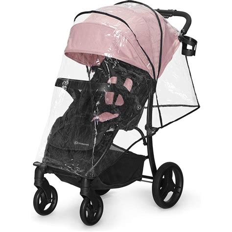 Bambino seduto in un passeggino con cappottina estesa