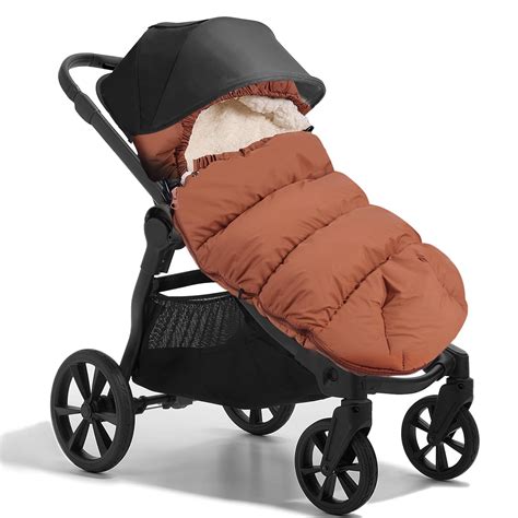 passeggino attrezzato per l'inverno con sacco termico e copertura