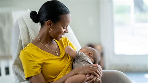 Breastfeeding mother with baby