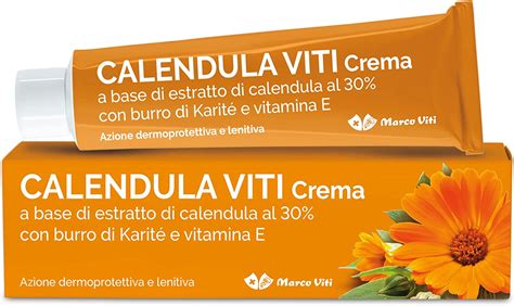 applicazione di una crema alla calendula su pelle arrossata