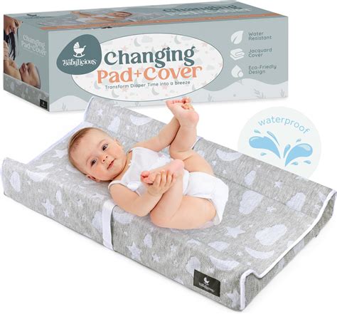 Detail of changing mat and safety rails on a changing table