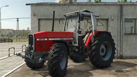 bambino che indossa una tuta Massey Ferguson in un contesto agricolo