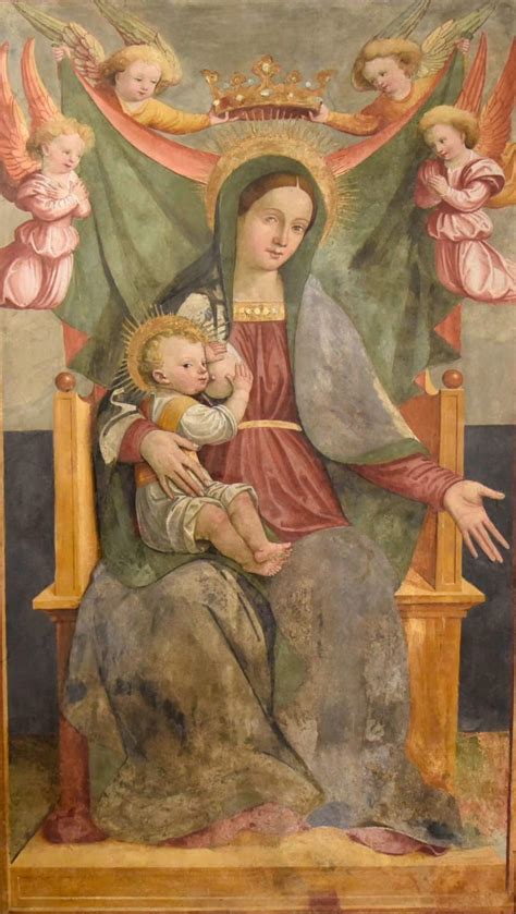 dettaglio di un affresco antico raffigurante una Madonna del Latte