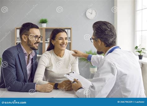 Couple talking to a doctor about fertility concerns