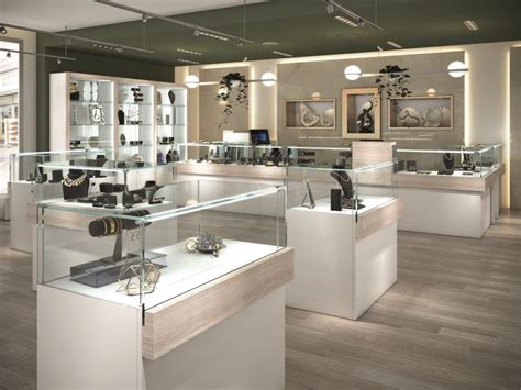 Vetrina di gioielleria con gemme e orologi