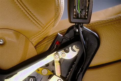Dettaglio del sistema di cinture di sicurezza di un seggiolone