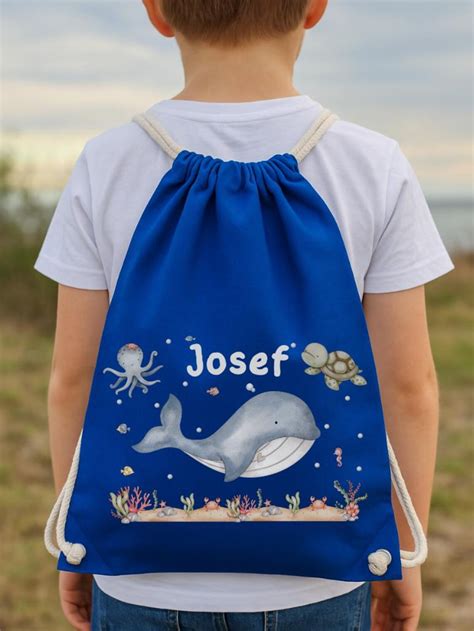 Borsa per l'asilo con bavaglini e posate