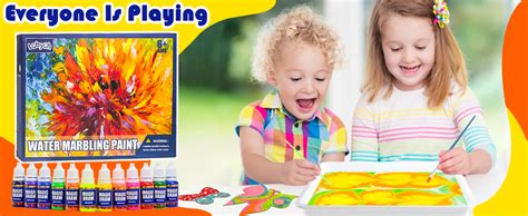 bambini che utilizzano il kit di pittura su pietre lekebaby
