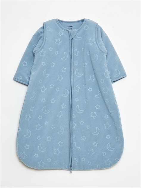 Dettaglio di cerniera e bottoni regolabili di un sacco nanna